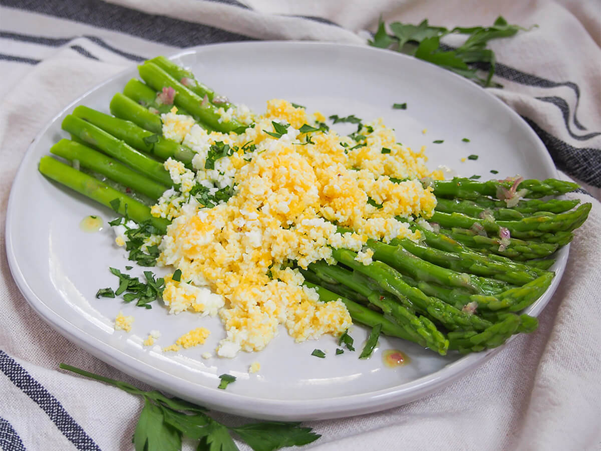 side view of plate of asparagus mimosa