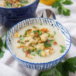 close view of Jerusalem artichoke soup topped with pangrattato toasted crumbs