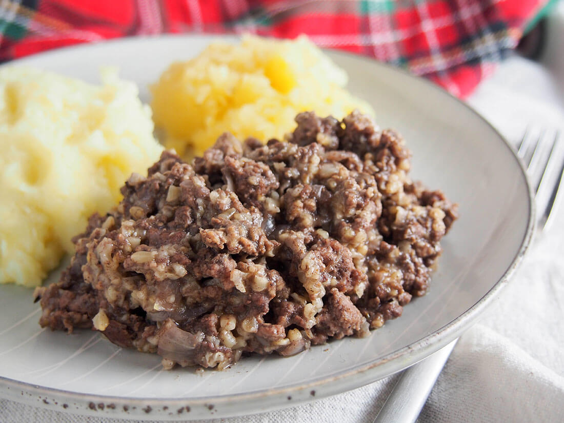 simplified haggis on plate with 'neeps and tatties'
