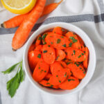 bowl of vichy carrots from overhead with carrots in corner.